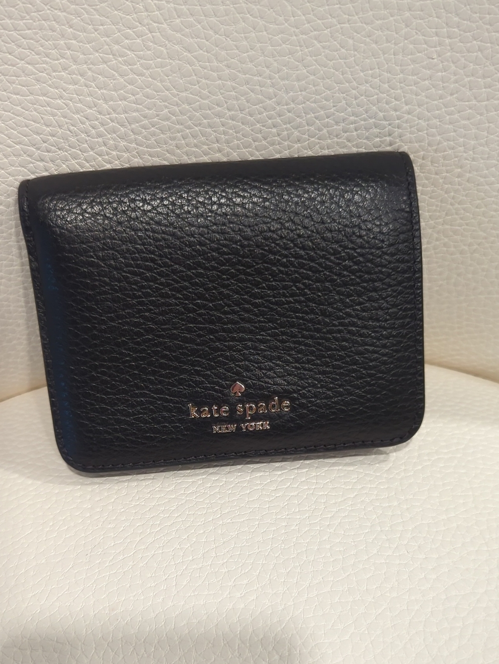 kate spade Black Pebbled Leather Bi-Fold Wallet with Gold Logo